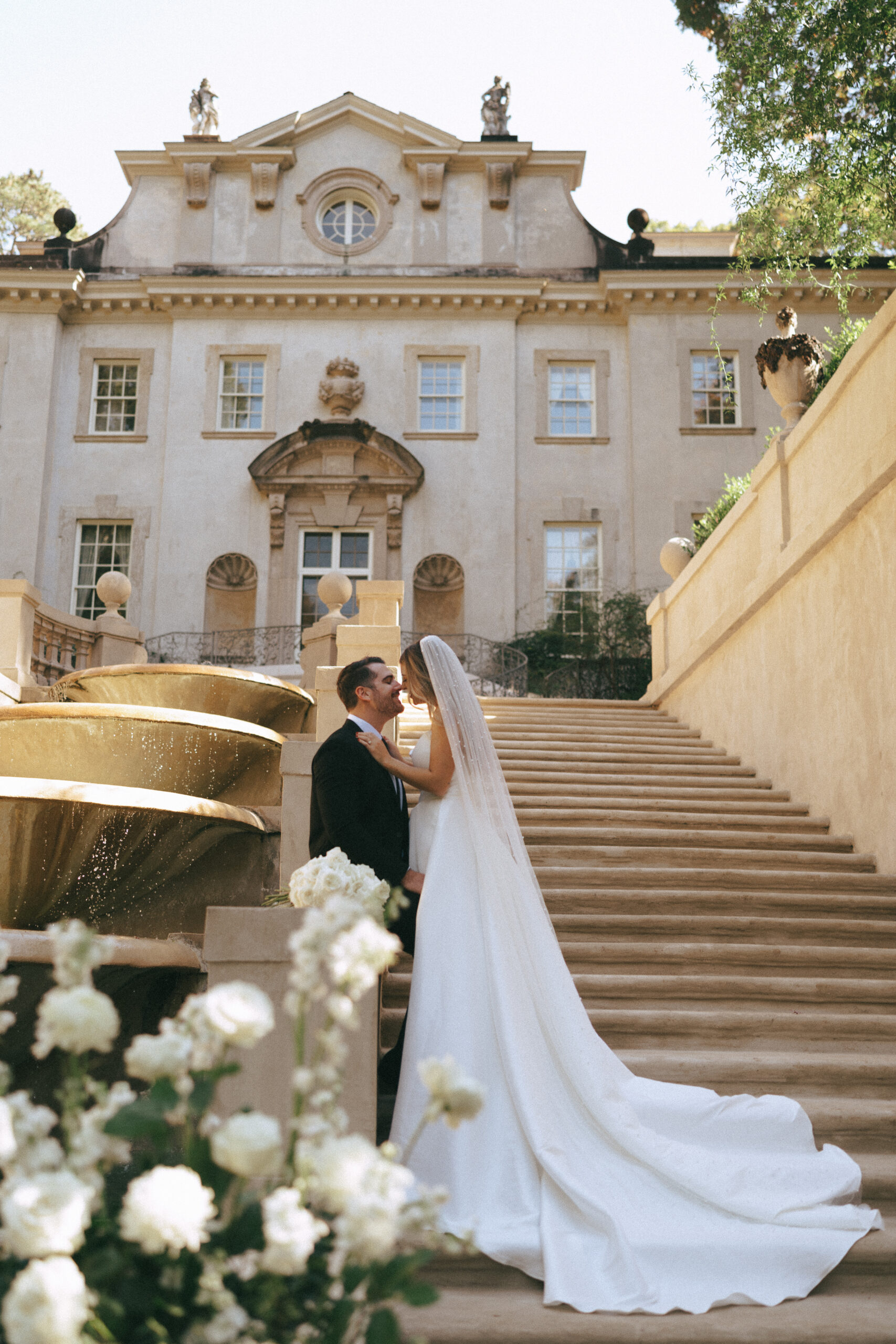 Bride and Groom on the steps of the Swan House in Atlanta, GA