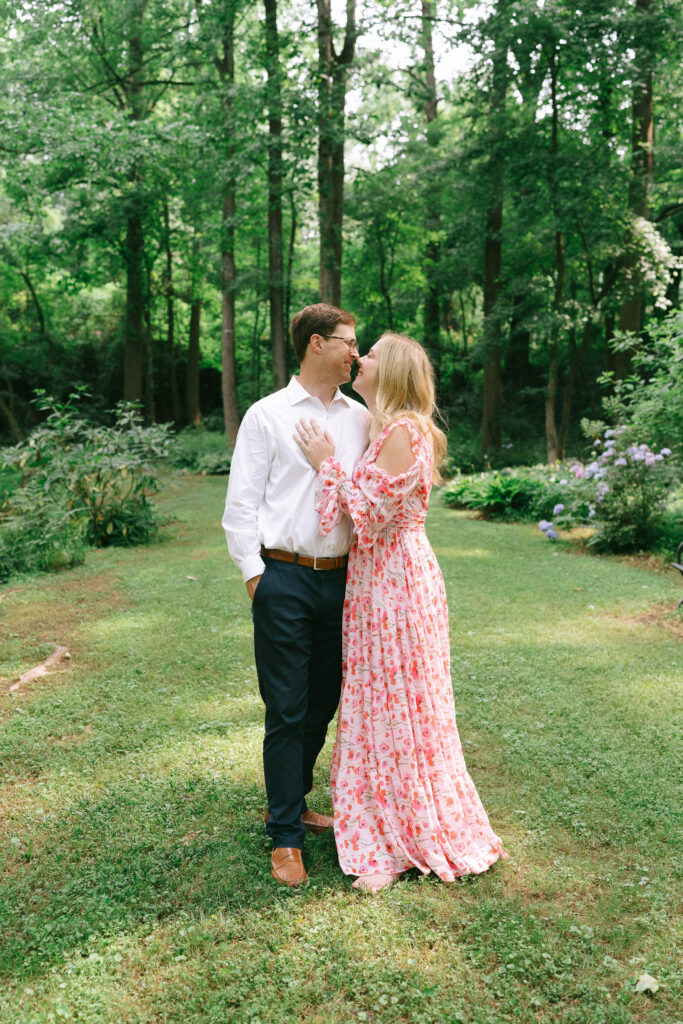 Couple standing in the courtyard at Cator Woolford Gardens.